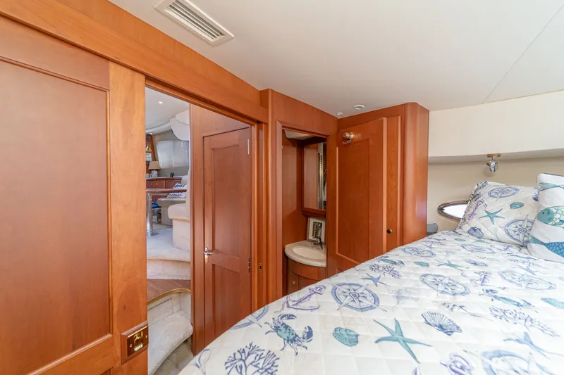 Slide: The Image of Interior of 2004 Silverton 39 MY Diesel yacht, bedroom view. - 38