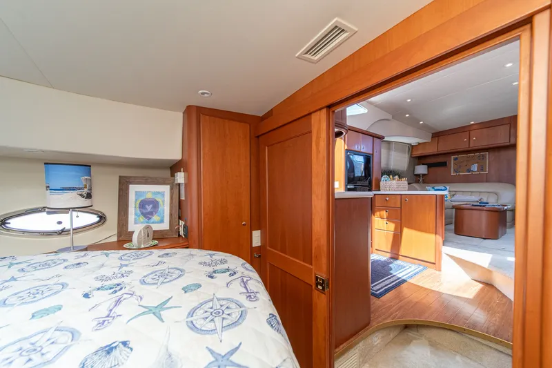 Slide: The Image of Interior of a 2004 Silverton 39 MY Diesel yacht, bedroom and living area. - 39