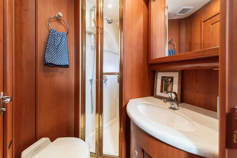 Slide: The Image of Luxurious bathroom in a 2004 Silverton 39 MY Diesel yacht. - 40