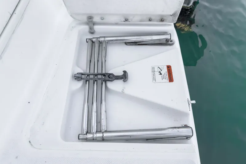 Slide: The Image of Folding swim ladder on Silverton 39 MY Diesel 2004. - 48