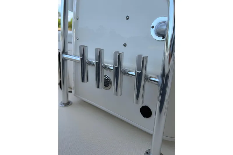 Slide: The Image of 2025 Pathfinder 2200 TRS boat rod holders and console detail. - 11