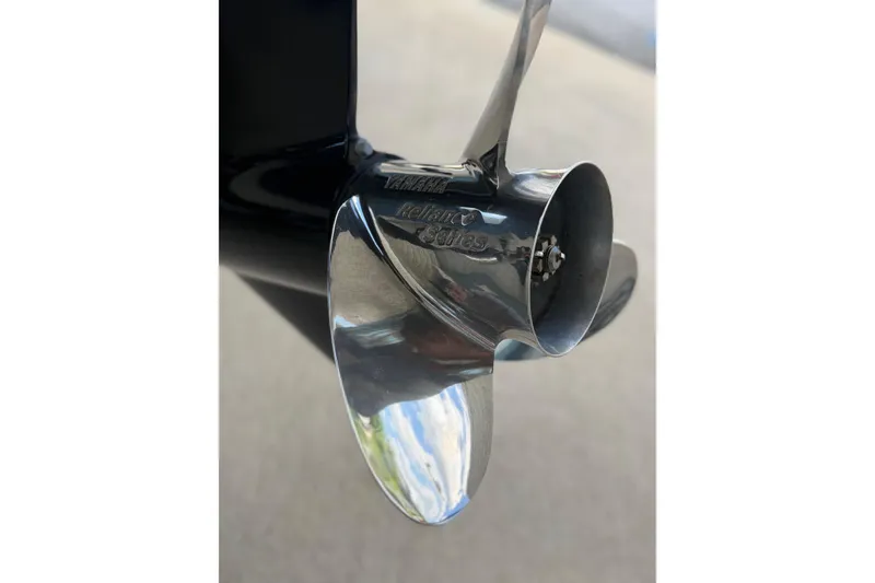 Slide: The Image of Shiny Yamaha Reliance Series propeller on 2025 Pathfinder 2200 TRS boat. - 9