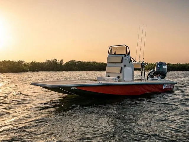 The Image of 2026 Freedom Boats 23' Warrior on water at sunset. - 1