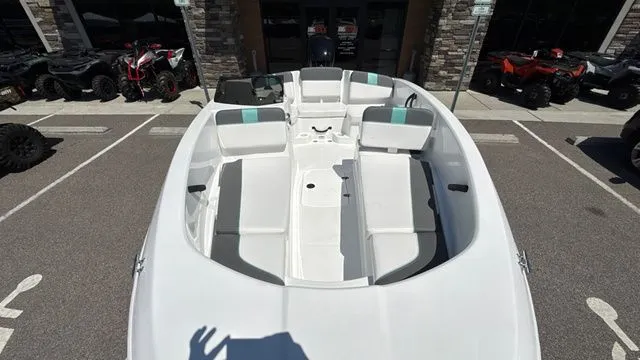 Slide: The Image of Interior view of 2026 Tahoe T16 boat in a parking lot. - 11