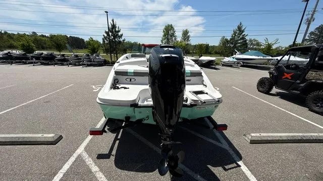 Slide: The Image of Rear view of a 2026 Tahoe T16 boat in a parking lot. - 6