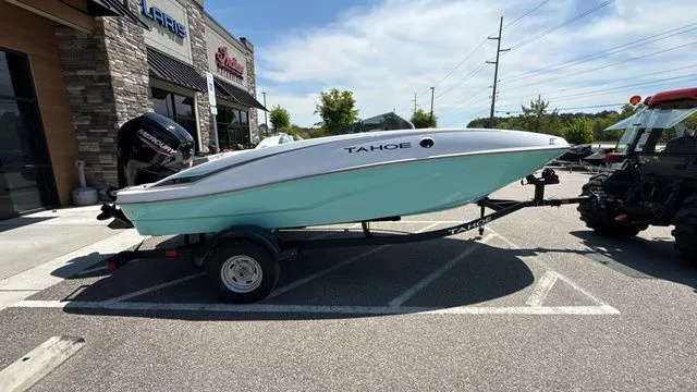 Slide: The Image of 2026 Tahoe T16 boat on trailer in parking lot. - 8
