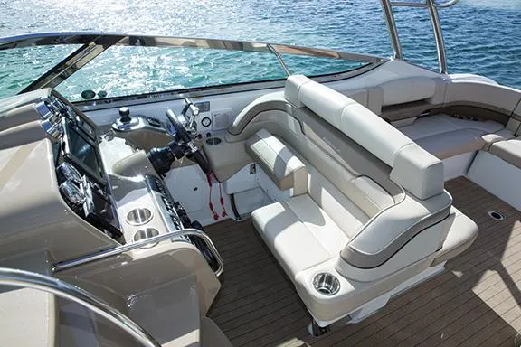 Slide: The Image of Manufacturer Provided Image: 2015 Formula 370 Super Sport boat interior with luxurious seating and modern controls. - 12