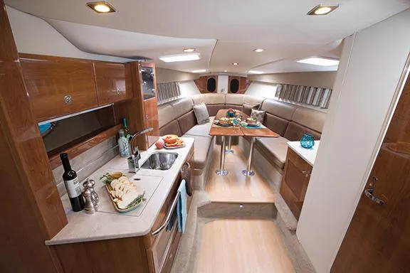 Slide: The Image of Manufacturer Provided Image: Luxurious interior of 2015 Formula 370 Super Sport yacht with kitchen and dining area. - 19