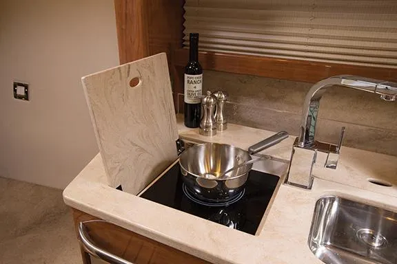 Slide: The Image of Manufacturer Provided Image: Modern kitchen area in 2015 Formula 370 Super Sport boat. - 22