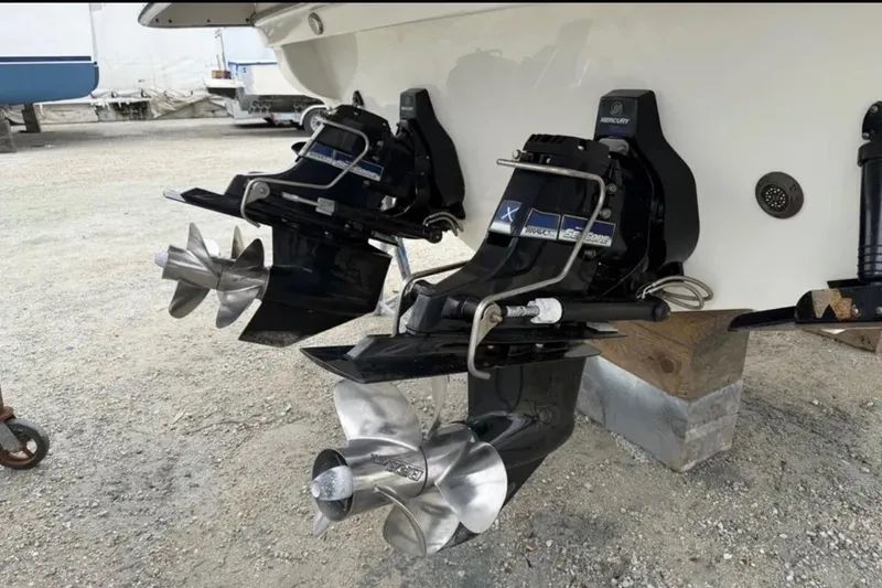 Slide: The Image of Dual propellers on a 2015 Formula 370 Super Sport boat, displayed on a stand. - 3