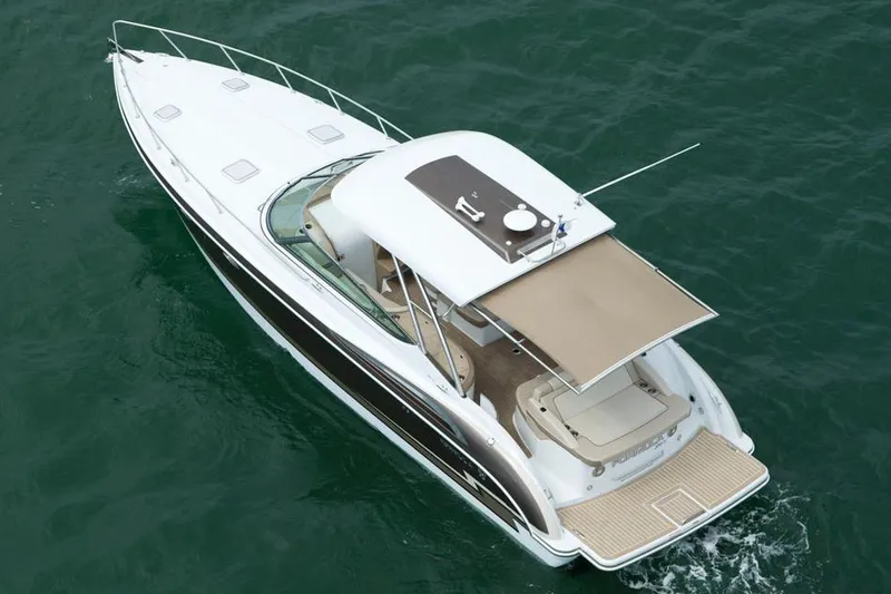 Slide: The Image of Manufacturer Provided Image: 2015 Formula 370 Super Sport boat cruising on water. - 9