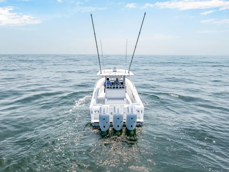 Slide: The Image of Front Runner 39 Center Console 2026 on open sea. - 14