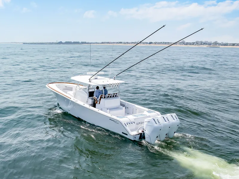 Slide: The Image of Front Runner 39 Center Console boat on open sea, year 2026. - 15
