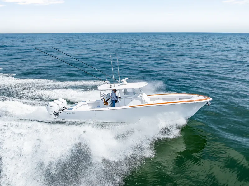Slide: The Image of Front Runner 39 Center Console 2026 cruising on open sea. - 3