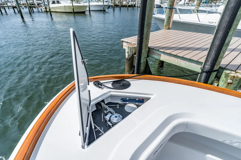 Slide: The Image of Front Runner 39 Center Console 2026 at dock, anchor compartment open. - 40