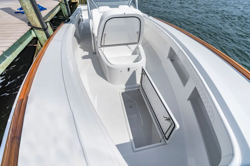 Slide: The Image of Front Runner 39 Center Console 2026 with open storage at dock. - 43