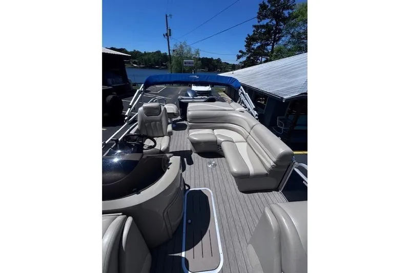 Slide: The Image of 2015 Bennington 2275 GS pontoon boat with spacious seating and sleek design. - 13