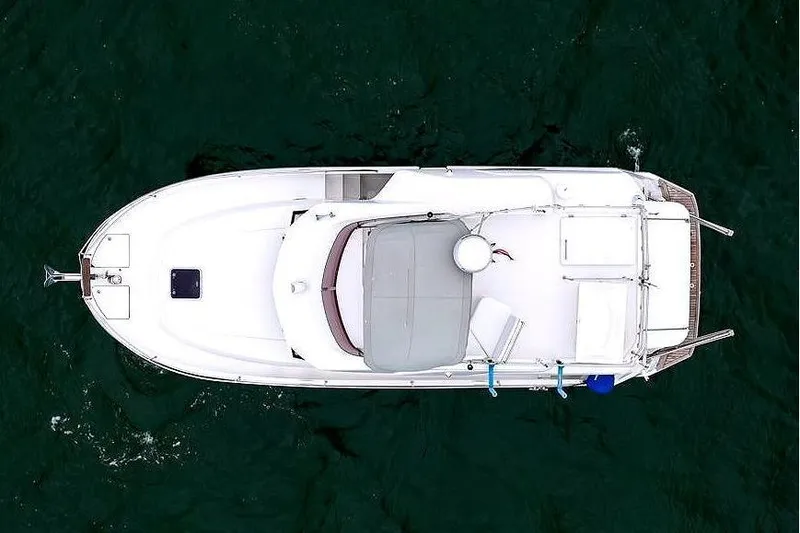 Slide: The Image of Overhead view of 2018 Beneteau Swift Trawler 30 on open water. - 20