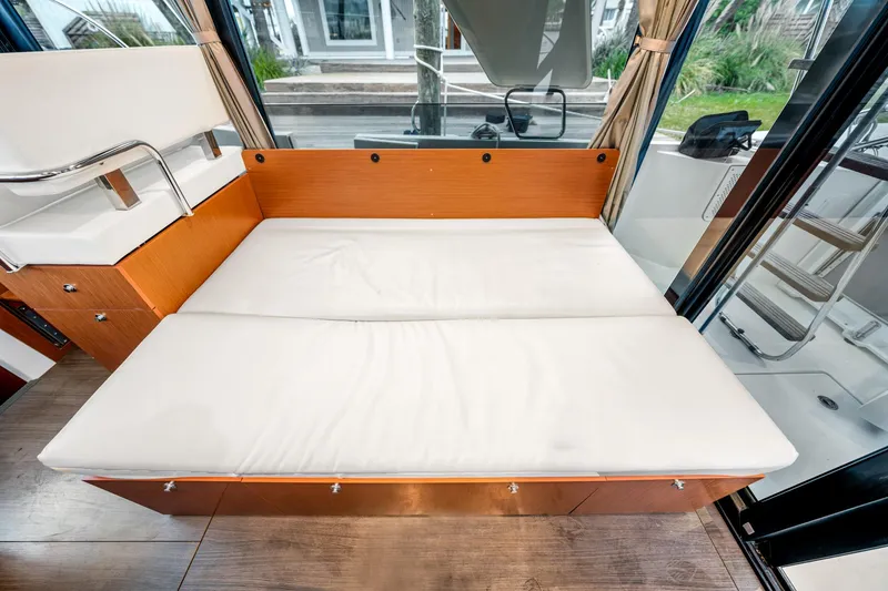 Slide: The Image of Interior view of 2018 Beneteau Swift Trawler 30 with convertible seating area. - 64