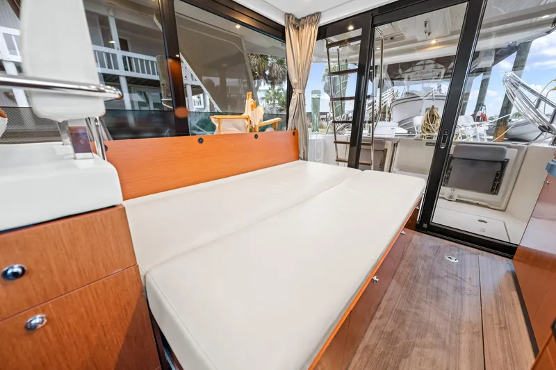 Slide: The Image of Interior of 2018 Beneteau Swift Trawler 30 with a cozy seating area. - 65