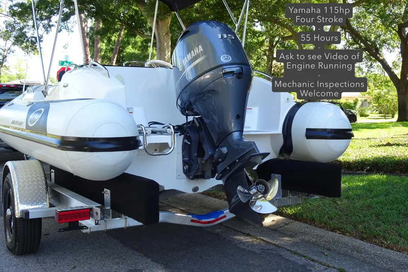 Slide: The Image of 2022 Walker Bay Generation 525 boat with Yamaha 115hp engine on trailer. - 2
