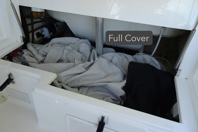 Slide: The Image of Storage compartment of 2022 Walker Bay Generation 525 with full cover inside. - 23