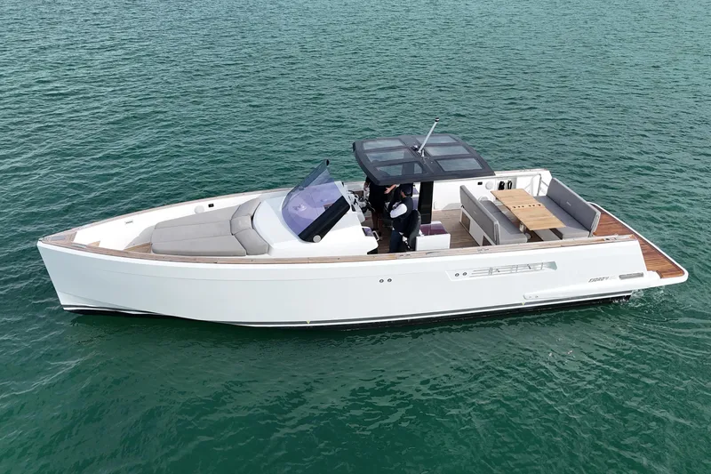 The Image of 2019 Fjord 40' Open yacht cruising on clear blue water. - 0