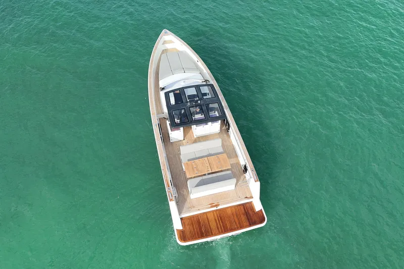 Slide: The Image of 2019 Fjord 40' Open yacht cruising on calm waters. - 22