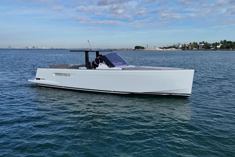 Slide: The Image of 2019 Fjord 40' Open yacht cruising on calm waters under a partly cloudy sky. - 3