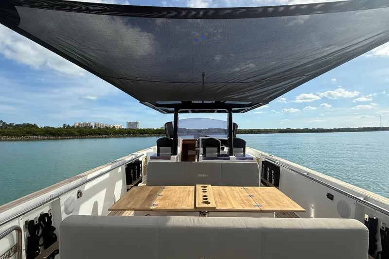 Slide: The Image of Wooden steps and speaker on 2019 Fjord 40' Open yacht deck. - 47