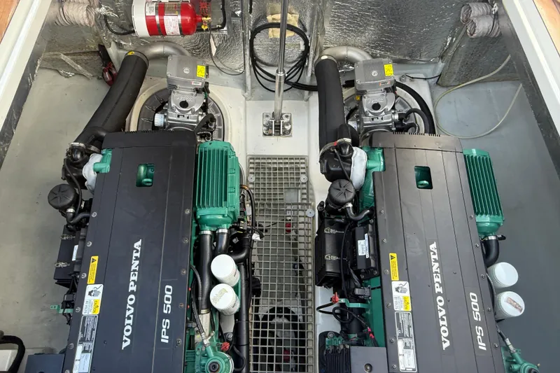 Slide: The Image of Engine compartment of a 2019 Fjord 40' Open yacht, showcasing mechanical components. - 49
