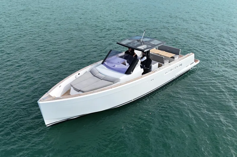 Slide: The Image of 2019 Fjord 40' Open yacht cruising on open water under clear skies. - 6