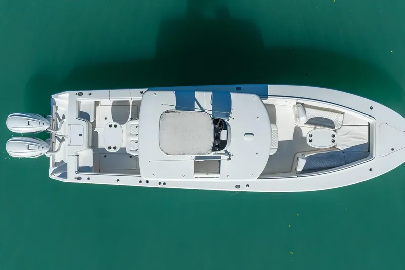 Slide: The Image of Aerial view of 2019 Jupiter 38 HFS boat on turquoise water. - 43