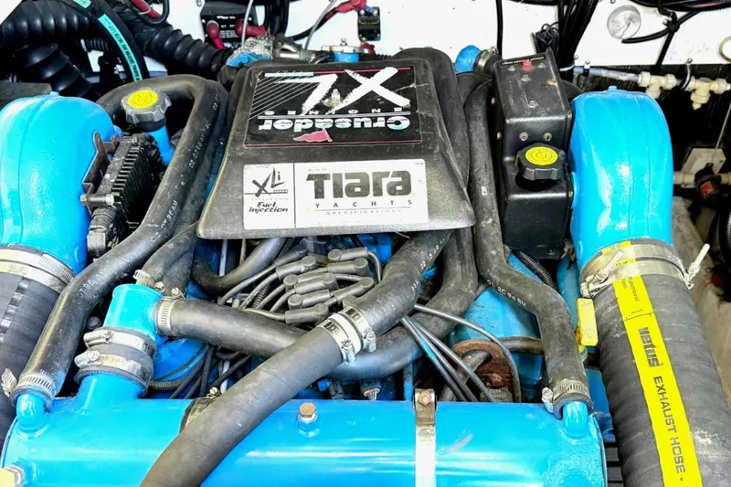 Slide: The Image of Engine of a 1997 Tiara 3100 Open Express yacht, featuring Crusader components. - 26