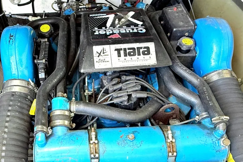 Slide: The Image of Engine of a 1997 Tiara 3100 Open Express boat, featuring Crusader XL components. - 27