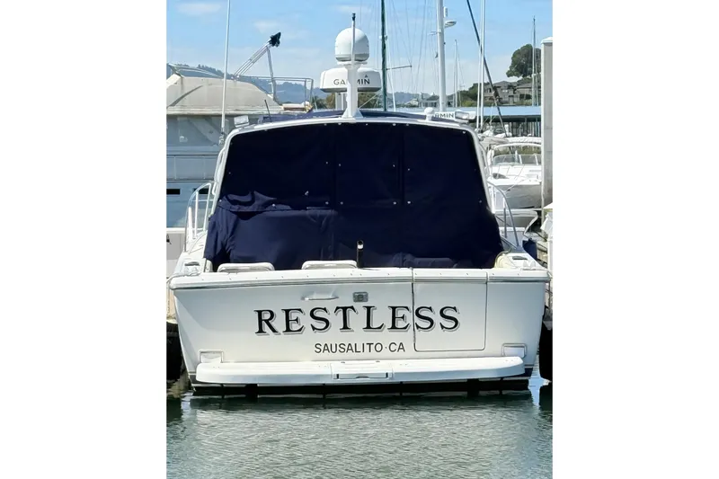 Slide: The Image of 1997 Tiara 3100 Open Express boat named "Restless" docked in Sausalito, CA. - 5