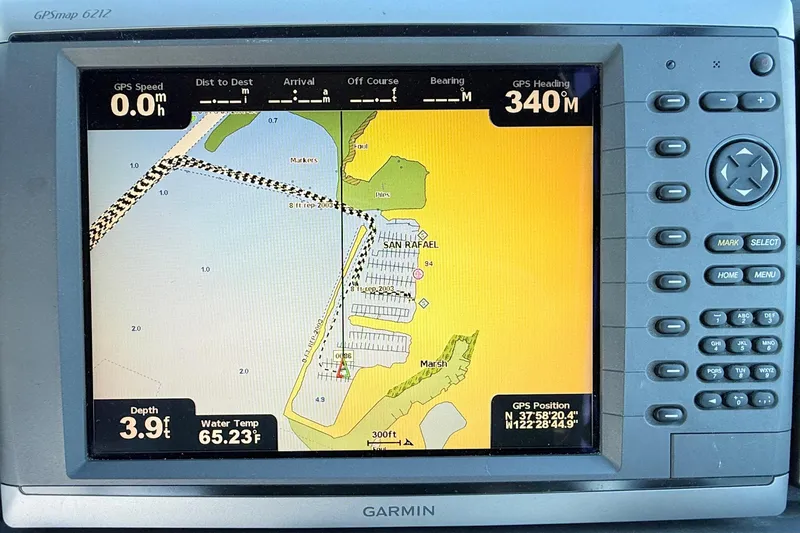 Slide: The Image of Garmin GPS display showing navigation map and data for Tiara 3100 Open Express, 1997 model. - 8