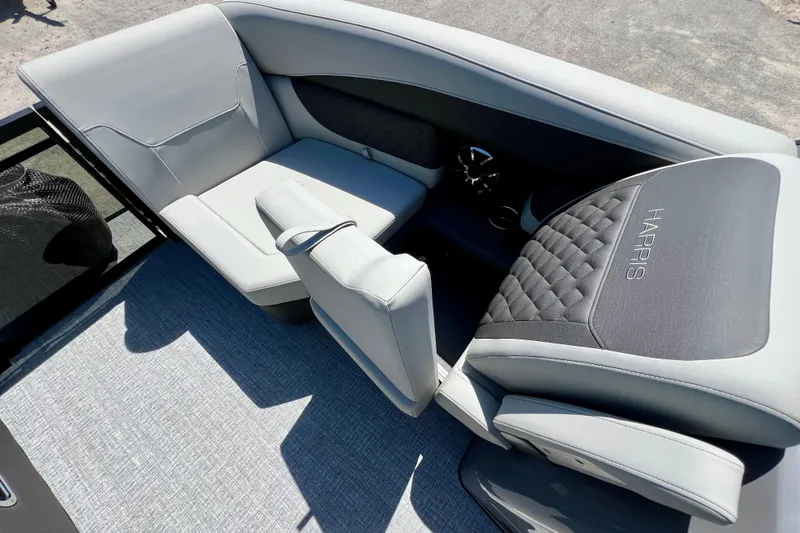 Slide: The Image of Luxurious seating on 2026 Harris Sunliner 210 pontoon boat, featuring elegant upholstery and design. - 21