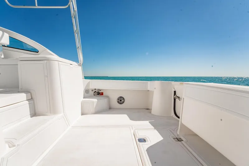 Slide: The Image of 2004 Luhrs Tournament 320 Open boat deck with ocean view under clear blue sky. - 12