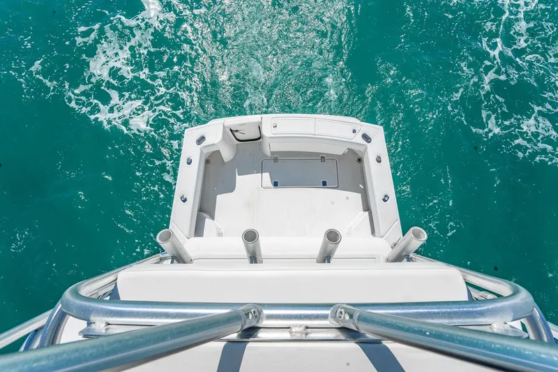 Slide: The Image of 2004 Luhrs Tournament 320 Open boat deck overlooking turquoise ocean waters. - 31