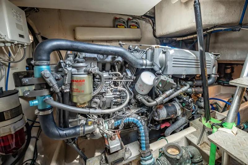 Slide: The Image of Engine room of 2004 Luhrs Tournament 320 Open, showcasing detailed mechanical components. - 43
