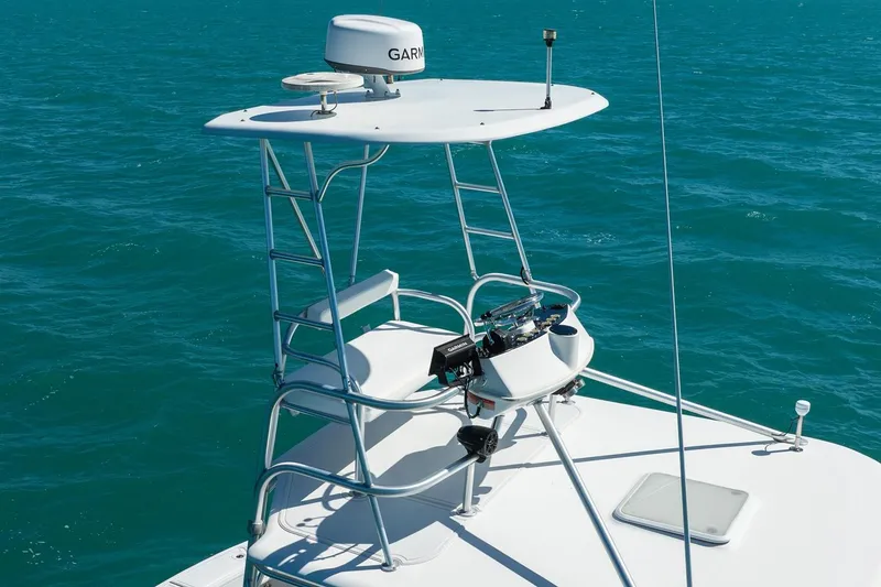 Slide: The Image of Tower of 2004 Luhrs Tournament 320 Open boat on blue ocean water. - 46