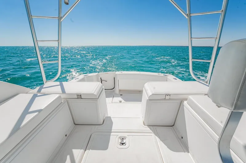 Slide: The Image of 2004 Luhrs Tournament 320 Open boat deck with ocean view under clear blue sky. - 9