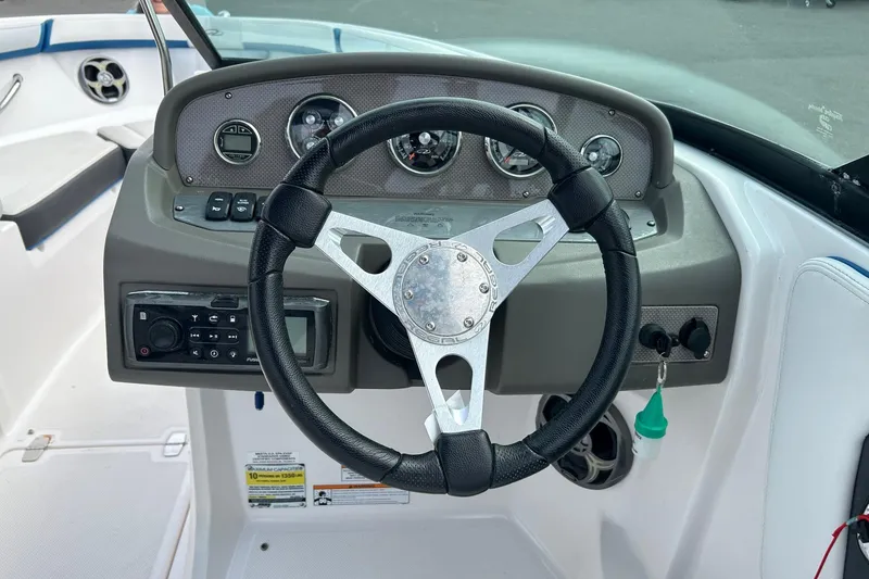 Slide: The Image of Steering wheel and dashboard of 2015 Regal 2000 ESX Bowrider boat. - 3