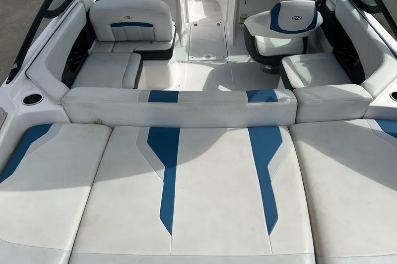 Slide: The Image of Interior of 2015 Regal 2000 ESX Bowrider with white and blue seating. - 8