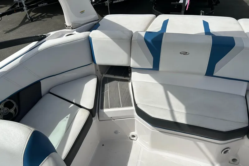 Slide: The Image of 2015 Regal 2000 ESX Bowrider interior with white and blue seating. - 9