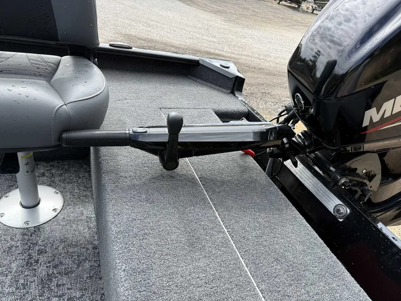 Slide: The Image of Tracker Super Guide V16 Tiller with Mercury 40 engine, gray seat. - 11