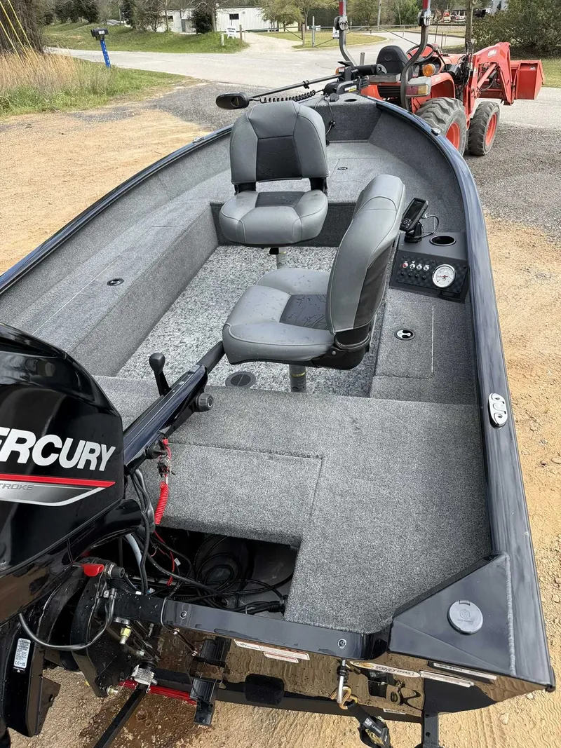 Slide: The Image of 2025 Tracker Super Guide V16 Tiller boat with Mercury 40 trailer. - 12