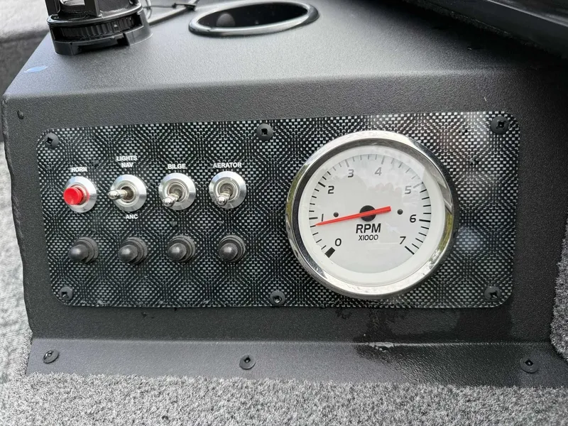 Slide: The Image of Dashboard of 2025 Tracker Super Guide V16 Tiller with RPM gauge. - 14