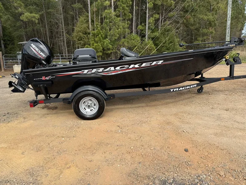 Slide: The Image of 2025 Tracker Super Guide V16 Tiller boat with Mercury 40 trailer. - 5